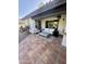 Covered patio with tile flooring and comfortable outdoor furniture, perfect for relaxation at 10205 E Corrine Dr, Scottsdale, AZ 85260