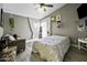 Cozy bedroom with a bed, a couch and natural lighting from the window at 112 E Joseph Way, Gilbert, AZ 85295