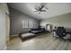 Bright bedroom with a ceiling fan, natural light and unique decor at 112 E Joseph Way, Gilbert, AZ 85295