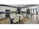 Spacious kitchen featuring a large center island with seating, perfect for entertaining and casual dining at 112 E Joseph Way, Gilbert, AZ 85295