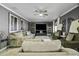 Inviting living room featuring stylish decor, ample seating, and a large TV for entertainment and relaxation at 112 E Joseph Way, Gilbert, AZ 85295