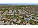 Scenic aerial view of a residential community featuring single-Gathering homes, desert landscaping, and neighborhood streets at 12727 W Lowden Rd, Peoria, AZ 85383