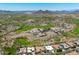 Wide aerial shot of upscale homes nestled near a golf course with desert landscaping and mountain views at 12727 W Lowden Rd, Peoria, AZ 85383