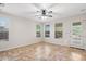 Bedroom with neutral paint, tile flooring, and a door to an outdoor balcony at 12727 W Lowden Rd, Peoria, AZ 85383