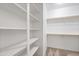 Walk-in closet with built-in shelving and ample storage space at 12727 W Lowden Rd, Peoria, AZ 85383