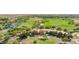 Attractive clubhouse with beautiful landscaping, ample parking, and golf course views in a desert community at 12727 W Lowden Rd, Peoria, AZ 85383
