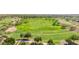 Scenic view of a golf course showcasing rolling greens, mature trees, and well-maintained fairways at 12727 W Lowden Rd, Peoria, AZ 85383