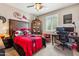 The bedroom is decorated in an Arizona Cardinals theme at 13088 N 91St Dr, Peoria, AZ 85381