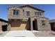 Beautiful two-story home with a two-car garage, desert landscaping, and neutral colors at 13294 W Eagle Feather Rd, Peoria, AZ 85383