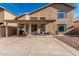 Covered patio provides ample space for outdoor dining and relaxation, perfect for enjoying the backyard at 13750 W Roanoke Ave, Goodyear, AZ 85395