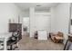 Carpeted bedroom featuring a closet, a desk, and a box for moving at 13750 W Roanoke Ave, Goodyear, AZ 85395