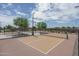 Well-maintained community pickleball court with desert landscaping at 16072 W Charlotte Dr, Surprise, AZ 85374