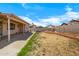 Spacious backyard with a covered patio and potential for outdoor enjoyment at 16240 W Maricopa St, Goodyear, AZ 85338