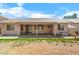 Enjoy outdoor living with a covered patio in this backyard ready for customization at 16240 W Maricopa St, Goodyear, AZ 85338