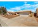 Lovely single-story home with a two-car garage, desert landscaping, and a clean, modern design at 16240 W Maricopa St, Goodyear, AZ 85338