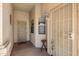 Cozy front porch with security doors, providing additional safety and curb appeal to the home at 16240 W Maricopa St, Goodyear, AZ 85338