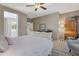 Spacious main bedroom boasting stylish decor, an open doorway, and elegant furnishings at 18023 W Statler St, Surprise, AZ 85388