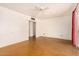 Spacious living room with sliding glass door, ceiling fan, and polished concrete floors at 2308 W Marlette Ave, Phoenix, AZ 85015
