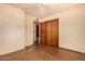 Bedroom features closet with sliding doors at 2308 W Marlette Ave, Phoenix, AZ 85015