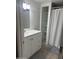 Bathroom with a modern sink, vanity, mirror, and tiled floor at 29 W Southern Ave # 28, Mesa, AZ 85210