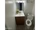 Cozy bathroom featuring a small sink and toilet at 29 W Southern Ave # 28, Mesa, AZ 85210