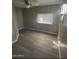 Bedroom with vinyl floors and natural light at 29 W Southern Ave # 28, Mesa, AZ 85210