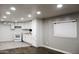 Bright, updated kitchen with white cabinets, range, and marble-look counters, leading into a dining area at 29 W Southern Ave # 28, Mesa, AZ 85210