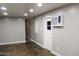 Living room features stylish wood-look flooring and recessed lighting, creating a modern and inviting space at 29 W Southern Ave # 28, Mesa, AZ 85210