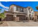 Charming two-story home with a three car garage and desert landscaping at 45247 W Jack Rabbit Trl, Maricopa, AZ 85139