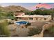 Aerial view of the estate featuring a pool, tennis court, large lot and mountain views at 4744 E Foothill Dr, Paradise Valley, AZ 85253