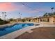 Expansive backyard with a sparkling pool, perfect for desert evenings and Gathering gatherings at 4744 E Foothill Dr, Paradise Valley, AZ 85253