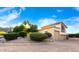 Two-story home with a three-car garage, desert landscaping, and a paved driveway at 4744 E Foothill Dr, Paradise Valley, AZ 85253