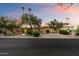 Spacious single-story home with mature trees, desert landscaping, and a circular driveway at 4744 E Foothill Dr, Paradise Valley, AZ 85253