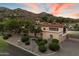 Bird's eye view showcasing the property's grand curb appeal with mature trees and landscaped areas at 4744 E Foothill Dr, Paradise Valley, AZ 85253