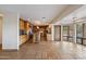 Open kitchen layout featuring a large island, stainless steel appliances, and tile flooring throughout at 4744 E Foothill Dr, Paradise Valley, AZ 85253