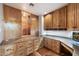 Office with wood cabinets, drawers, granite counter and desk space, plus a cedar closet with an overhead light at 4744 E Foothill Dr, Paradise Valley, AZ 85253