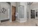 Bathroom corner with a glass block window, built-in cabinet, and a towel rack at 5291 S Bradshaw Pl, Chandler, AZ 85249