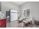 Versatile flex room with a stylish Murphy bed, seating, and decorative elements at 5291 S Bradshaw Pl, Chandler, AZ 85249