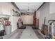 Organized garage with storage solutions and space for multiple vehicles and projects at 5291 S Bradshaw Pl, Chandler, AZ 85249