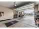 Spacious garage featuring room for three cars, convenient storage cabinets, and easy access to the outdoors at 5291 S Bradshaw Pl, Chandler, AZ 85249