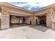 Spacious three car garage offering ample storage and parking, and a stone exterior finish at 5291 S Bradshaw Pl, Chandler, AZ 85249