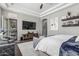 Relaxing main bedroom featuring a seating area and stylish decor at 5291 S Bradshaw Pl, Chandler, AZ 85249