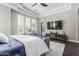 Large main bedroom with access to the outdoors and a TV viewing area at 5291 S Bradshaw Pl, Chandler, AZ 85249