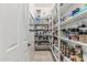 Walk-in pantry with custom shelving, providing tons of storage space at 5291 S Bradshaw Pl, Chandler, AZ 85249