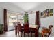 Cozy dining room with a decorative table and chairs, perfect for Gathering meals at 6320 W Mercer Ln, Glendale, AZ 85304