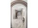 Beautiful bathroom with marble floors, soaking tub, walk-in shower, and vanity as seen from an arched entryway at 7199 E Ridgeview Pl # 221, Carefree, AZ 85377