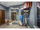 Home exercise room with a large mirror and a flat-screen television at 7199 E Ridgeview Pl # 221, Carefree, AZ 85377