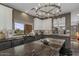 Modern kitchen with sleek countertops, stainless steel appliances, and a view to the outside at 7199 E Ridgeview Pl # 221, Carefree, AZ 85377
