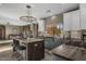 Bright kitchen featuring a marble island with barstool seating and stainless steel appliances at 7199 E Ridgeview Pl # 221, Carefree, AZ 85377