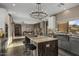 Spacious kitchen with a center island, stainless steel appliances, and modern fixtures at 7199 E Ridgeview Pl # 221, Carefree, AZ 85377
